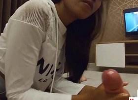 Lay Thai teen Cherry giving a beast cook jerking just about a big ashen dick