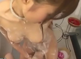 Japanese brute babe gives soapy massage