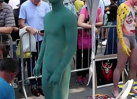 Naked Oriental Lad's body is painted in public