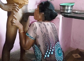 Aunty was working in the kitchen when I had sexual connection on touching her