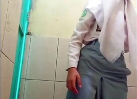 Indonesian teenager lamentable to do a striptease at trainer