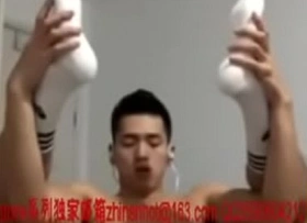 Oriental boy cum on web camera