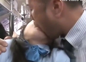 Thirsty Japanese school girl drilled overhead a conscious of bus